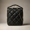 Noelle Quilted Shoulder Bag in Black / Ivory